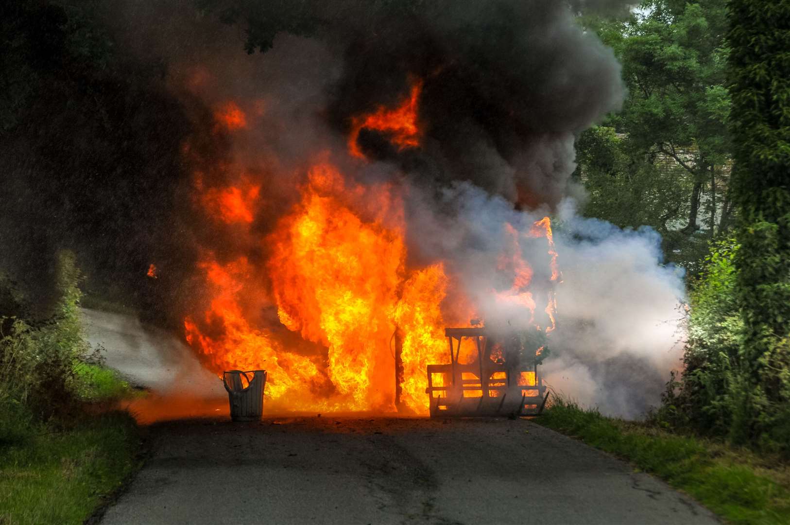 The flames engulf the entire width of the road. Picture Chris Lawson - Lawsonpics.com