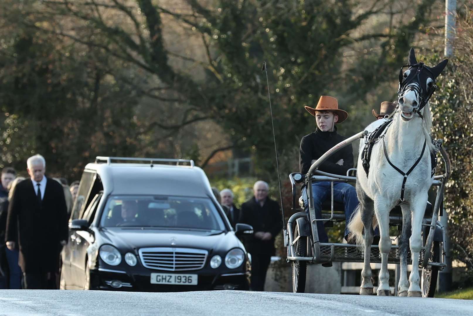 The funeral cortege of 15-year-old Matthew McCallan arrives at St Malachy’s Church, Edendork (Liam McBurney/PA)