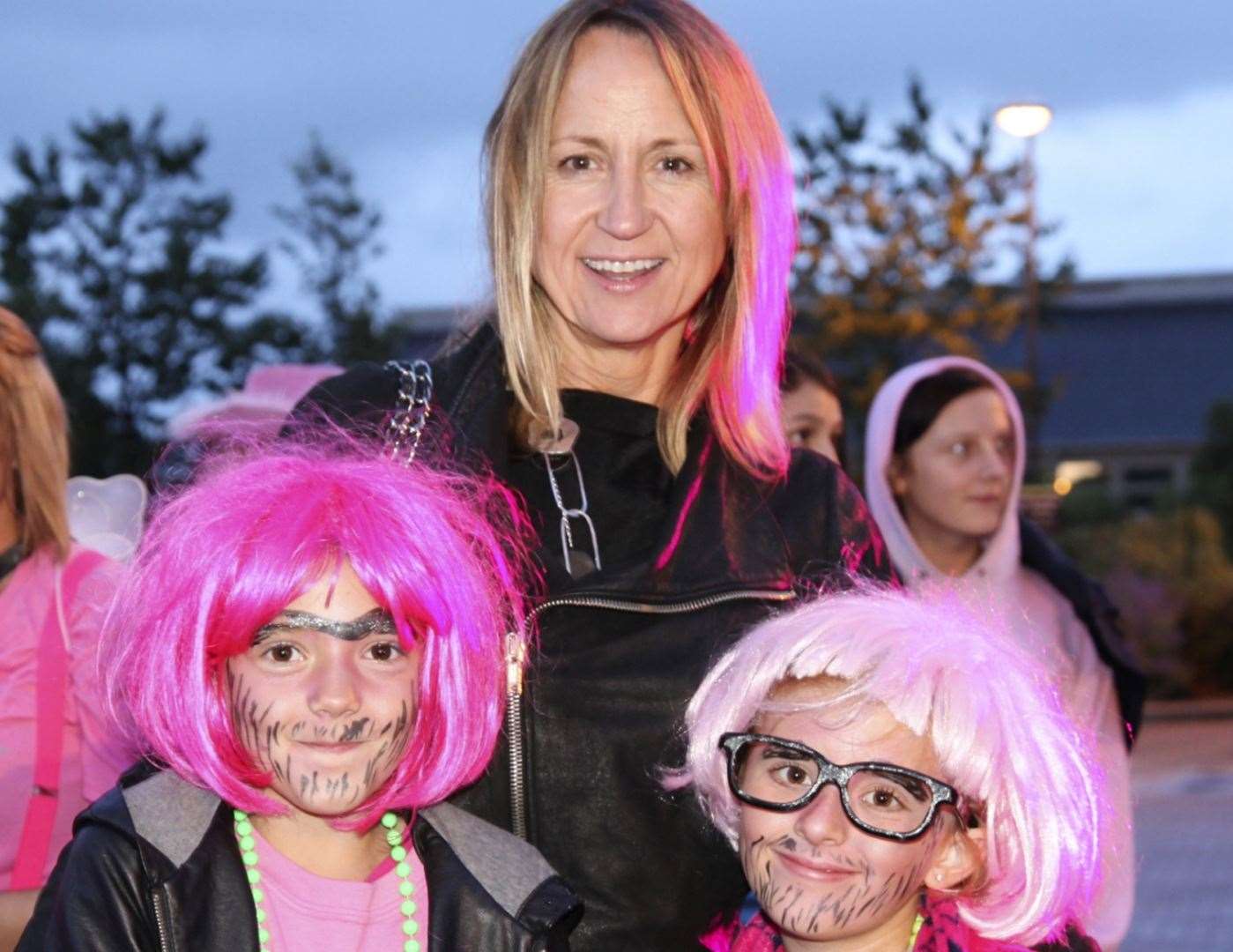 Amy Holder and Elise Cade, both 10, with radio and TV presenter Carol McGiffin at a previous Moonlit Walk. Picture: Maria Higham