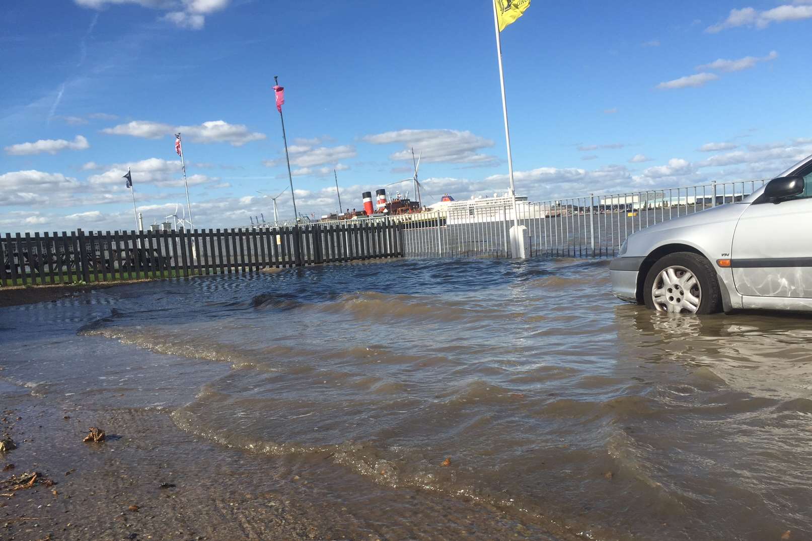 The water covered part of the road next to the River Thames near St Andrew's Arts Centre. Picture: Pete Clarke