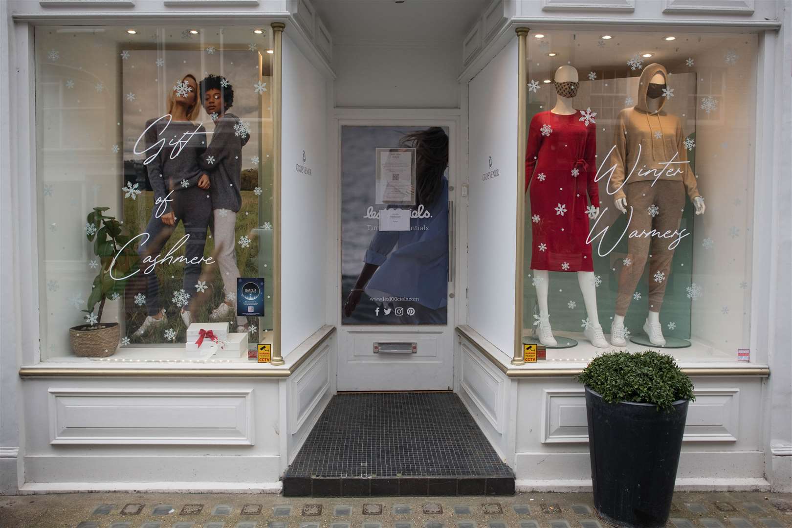 A shop in London’s South Molton Street displaying Christmas decorations in March 2021 after having to close suddenly on December 20 (Stefan Rousseau/PA)