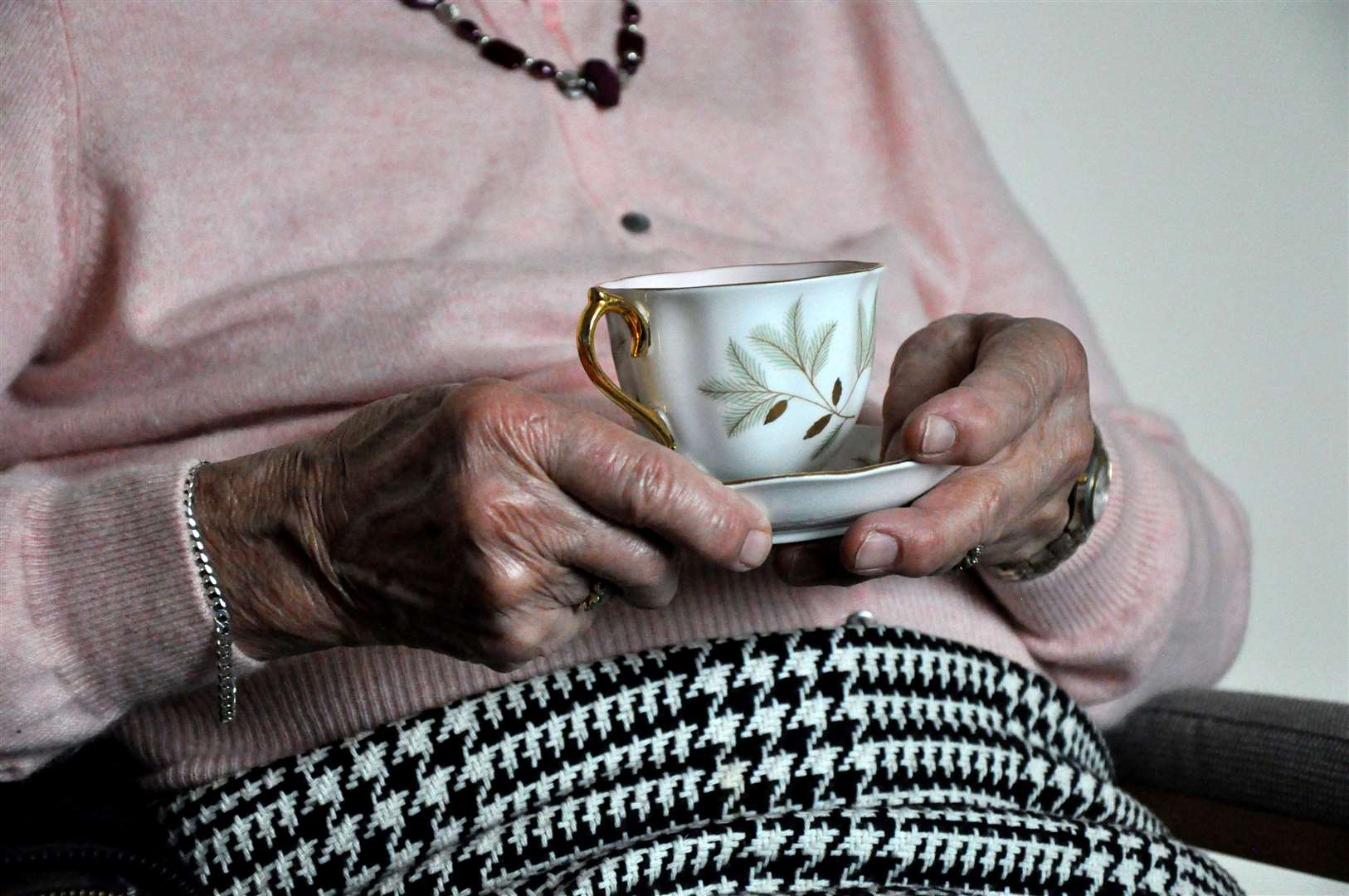 The elderly woman woke to find a torchlight shining on her landing. Stock picture