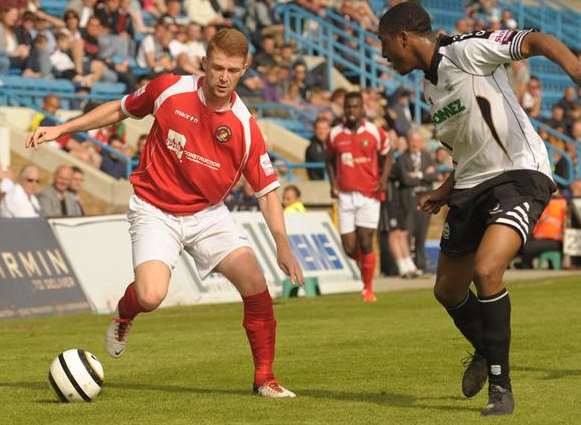 Alex Osborn takes on Dover in the Kent Senior Cup final Picture: Steve Crispe