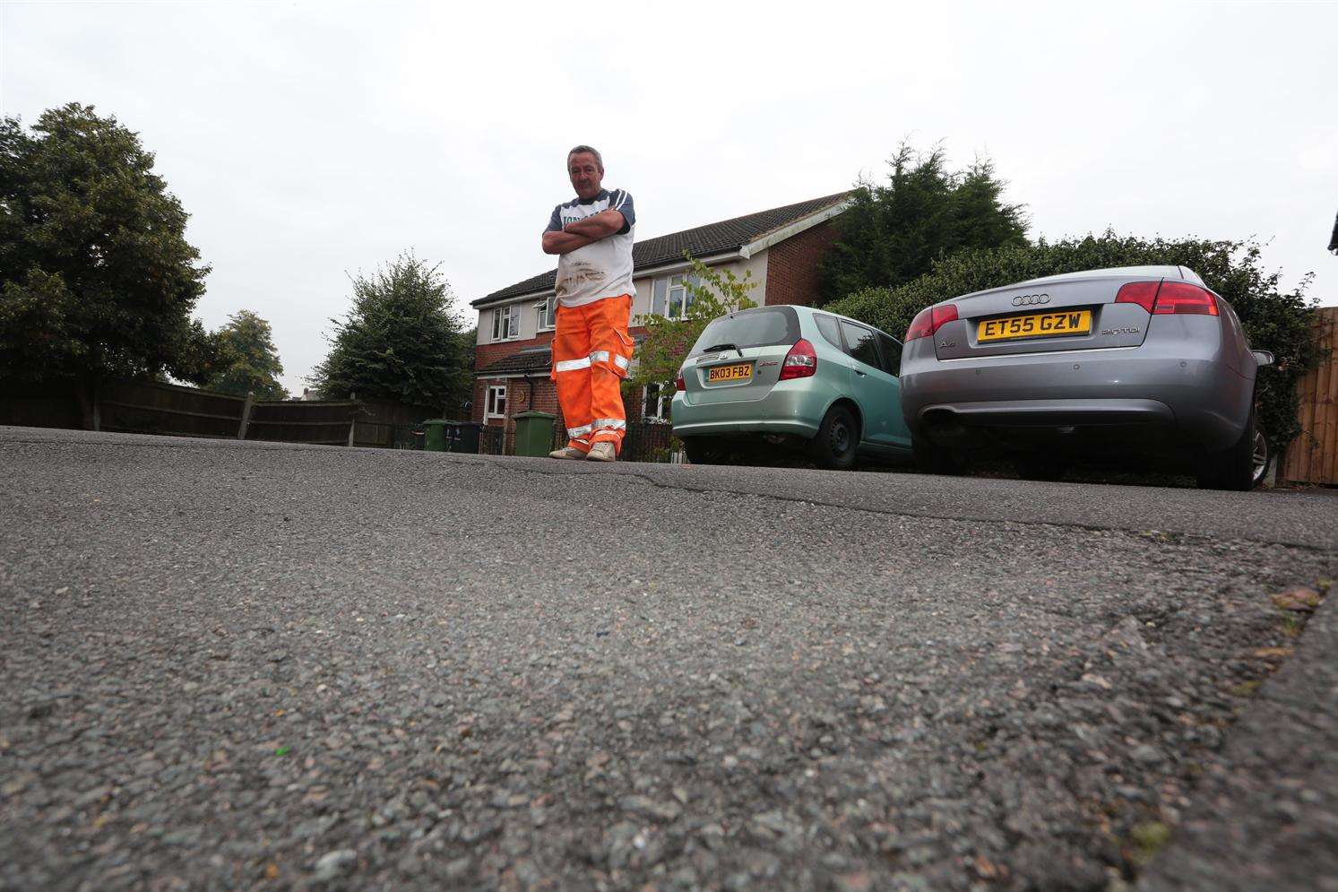 Lee Thwaites of Springwood Road, Barming, says the residents' car park outside his house is sinking every day