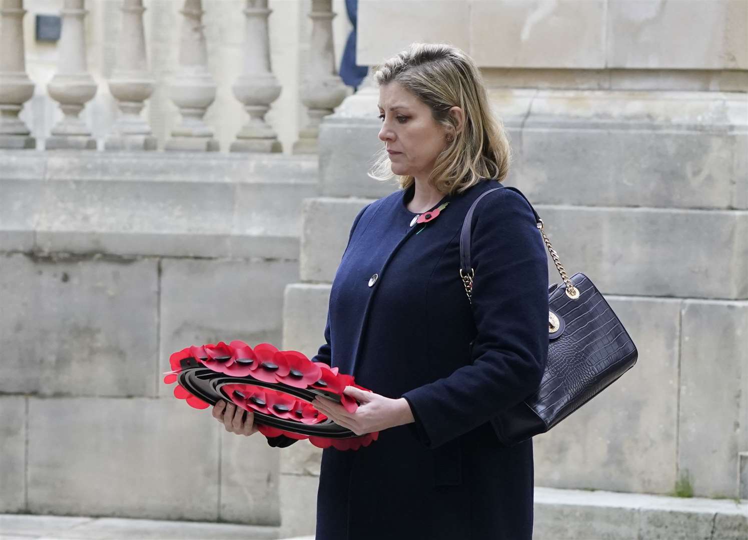 Penny Mordaunt, MP for Portsmouth North, laying a wreath on Remembrance Sunday in 2023 (Andrew Matthews/PA)