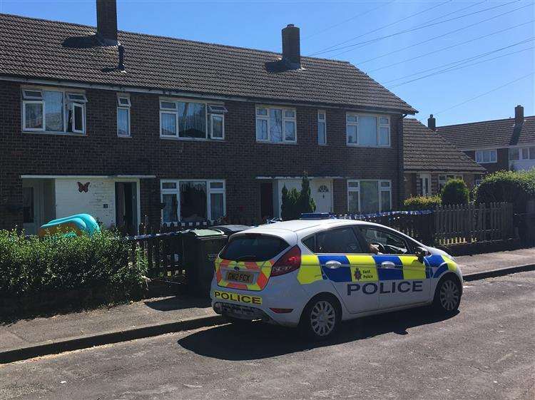 Police car outside the East Malling house in Larkspur Close.