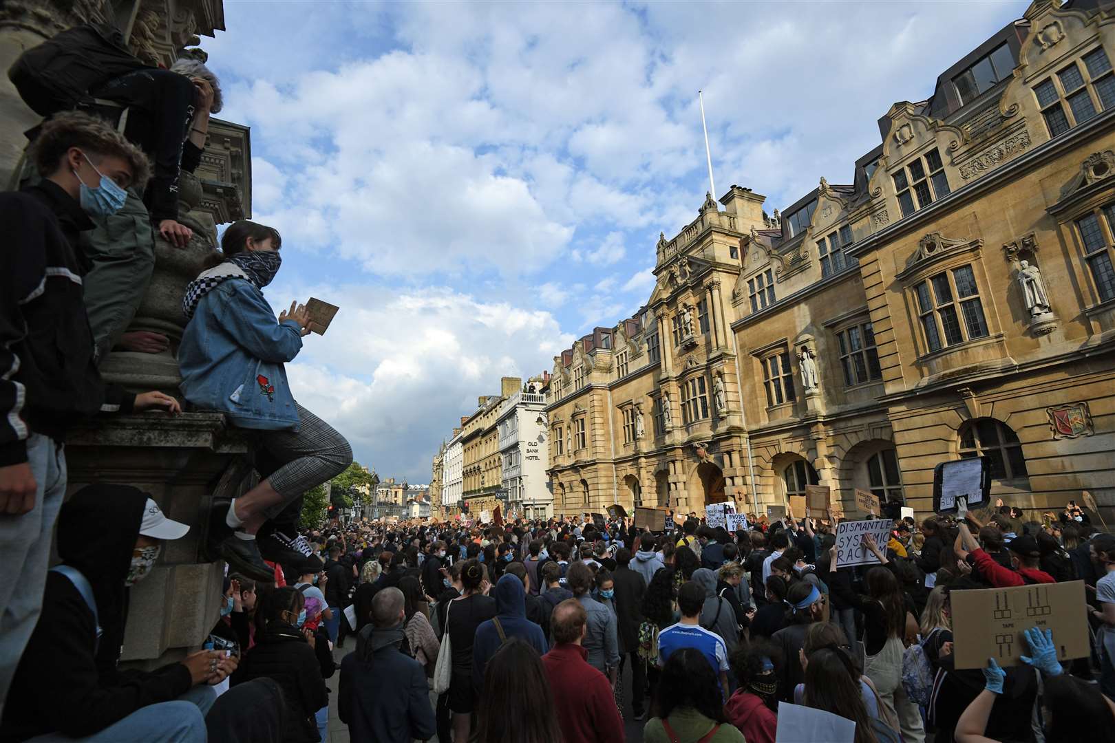 Protesters in front of Oriel College (Joe Giddens/PA)