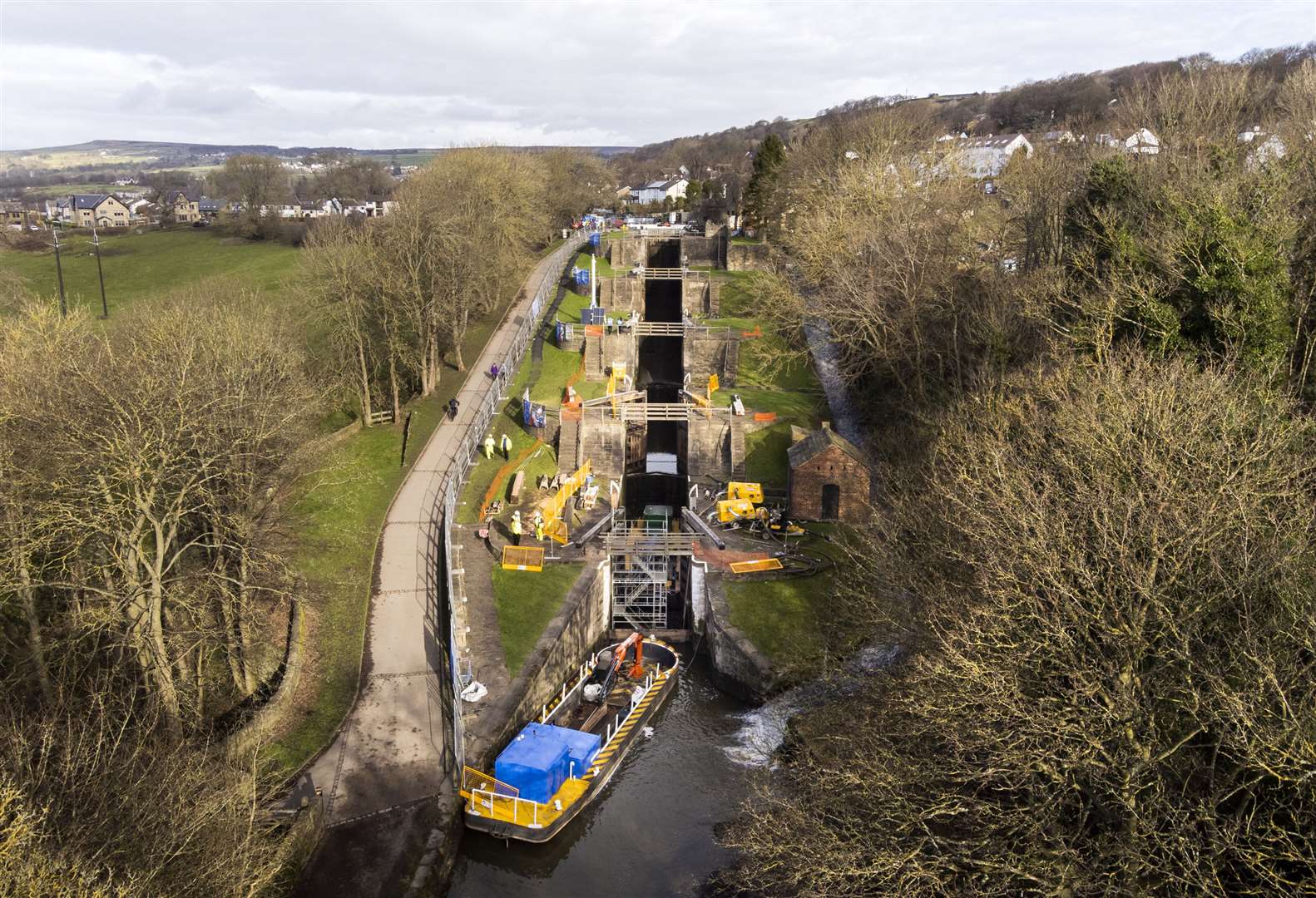 Engineers from the Canal and River Trust replace Britain’s tallest set of lock gates at Bingley Five Rise Locks, West Yorkshire (Danny Lawson/PA)