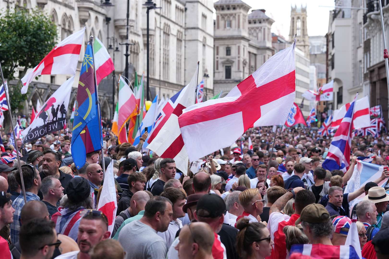 Crowds gather in central London for Tommy Robinson protest and counter ...