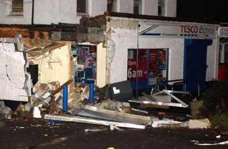 The raiders smashed through the shop front. Picture: TERRY SCOTT