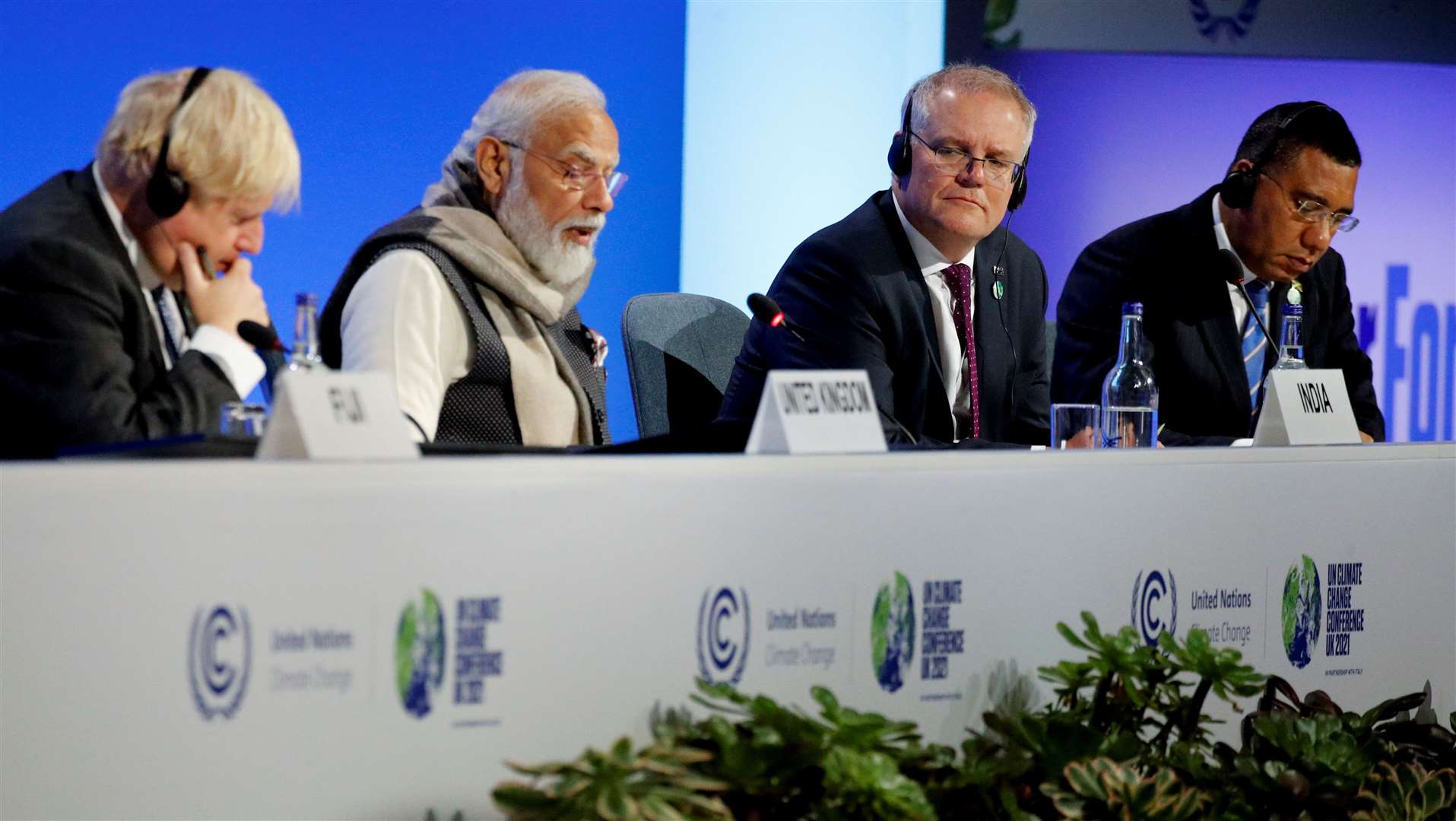 Prime Minister Boris Johnson, India’s PM Narendra Modi, Australia’s premier Scott Morrison, and Jamaica’s prime minister Andrew Holness during a UK-India event at the Cop26 summit (Phil Noble/PA)