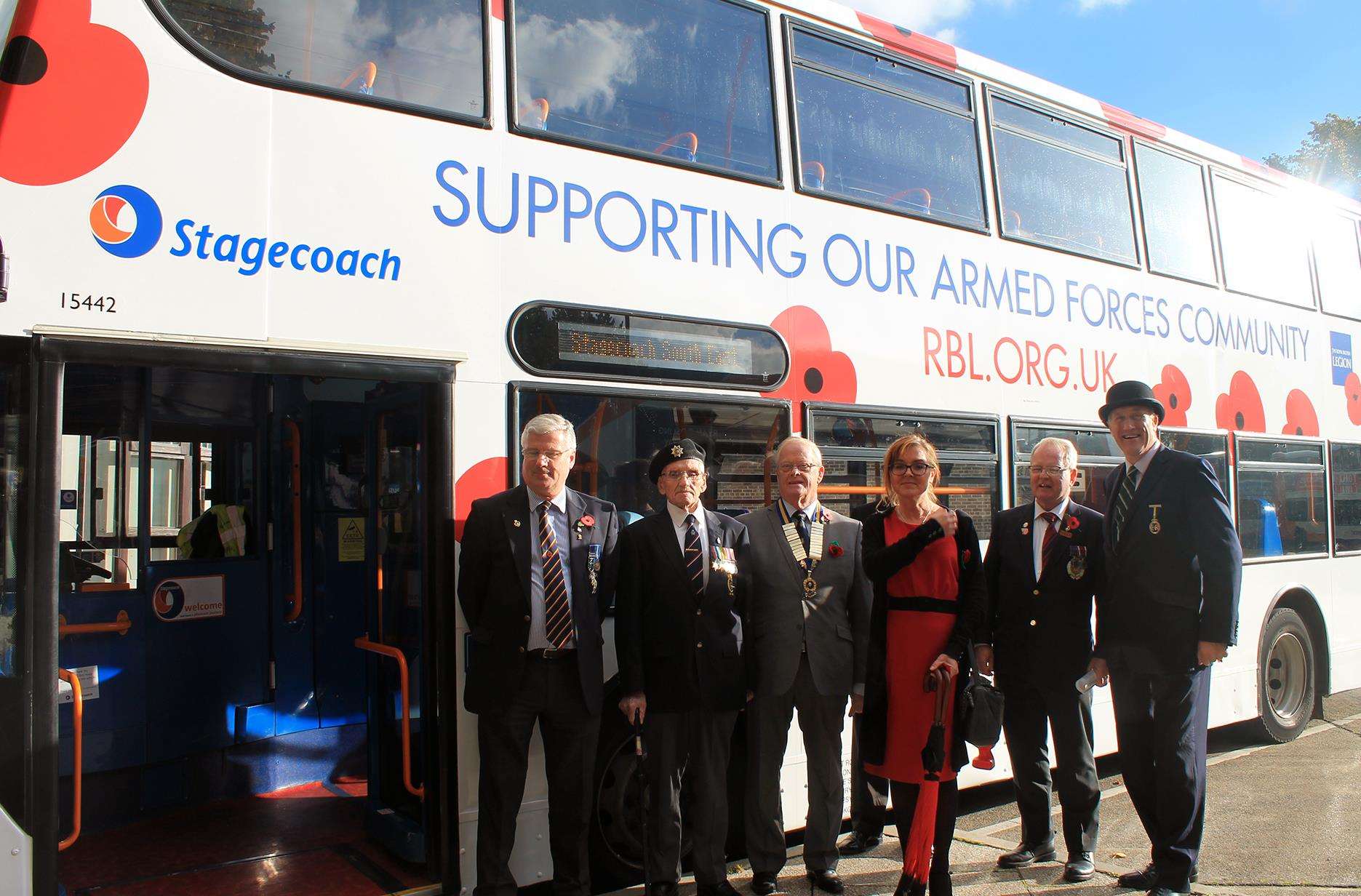 The Poppy Bus launch at Canterbury Bus Station. Those show include Ian Loftus, left, Jane Ayres, centre, and Sir Julian Brazier, right. Picture from Stagecoach