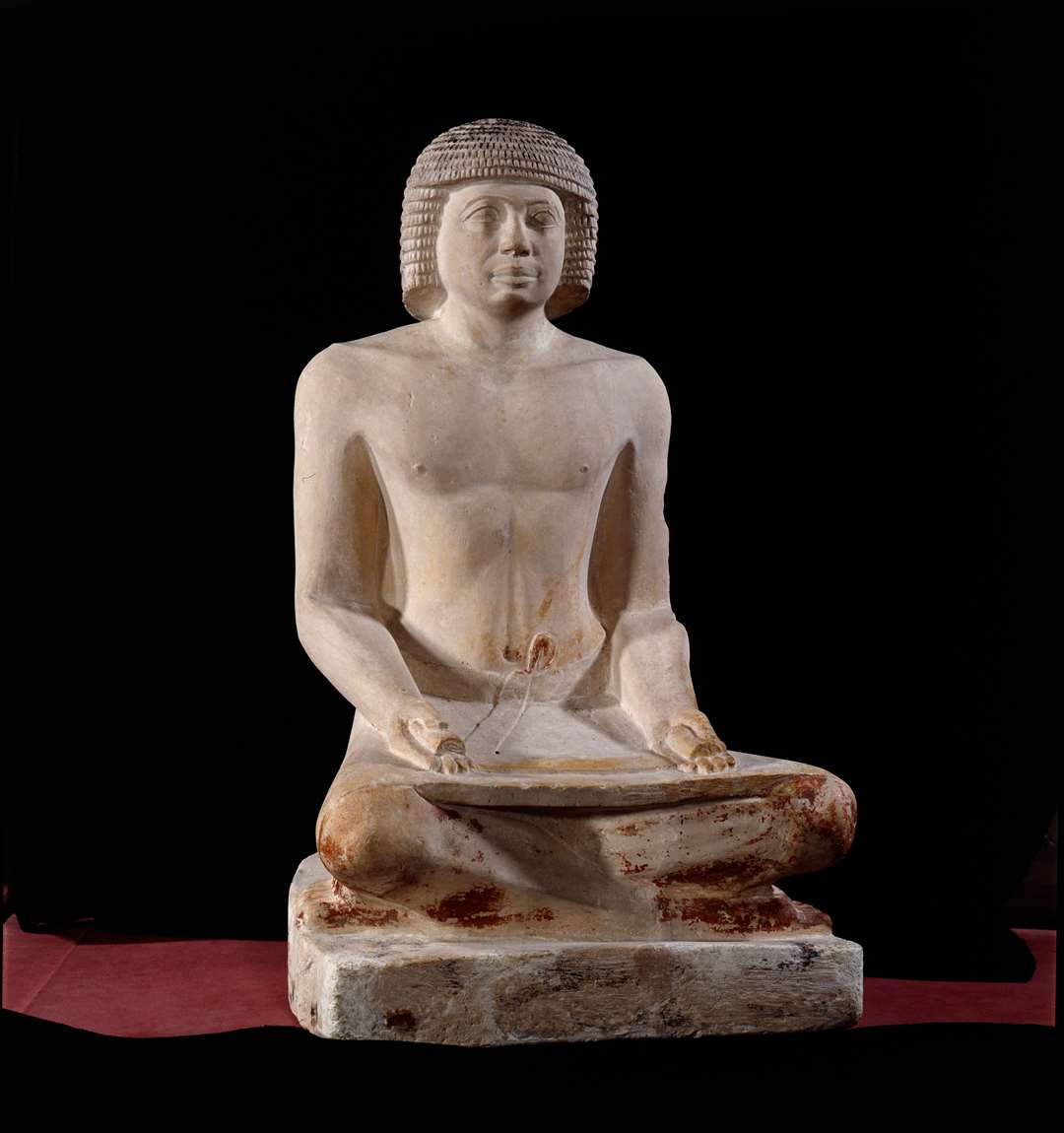 Statue of a scribe (Musee du Louvre/PA)