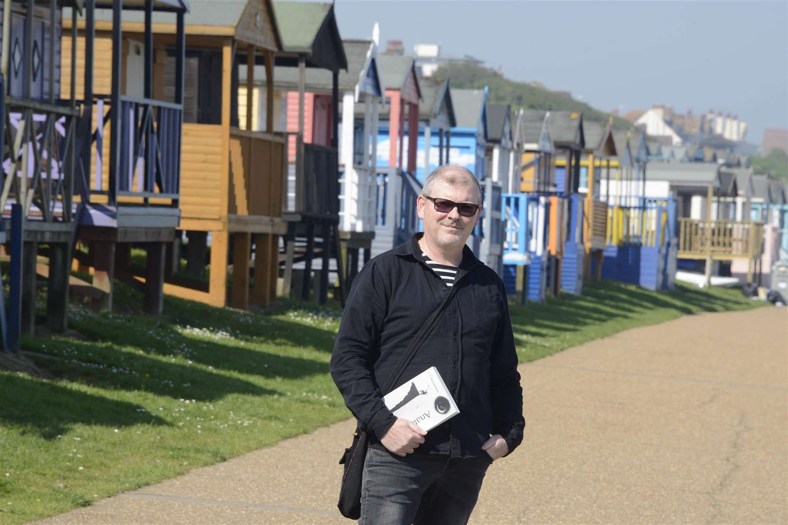 Author Andrew McGuinness on Tankerton Slopes, where some of his story is set. Picture: Paul Amos