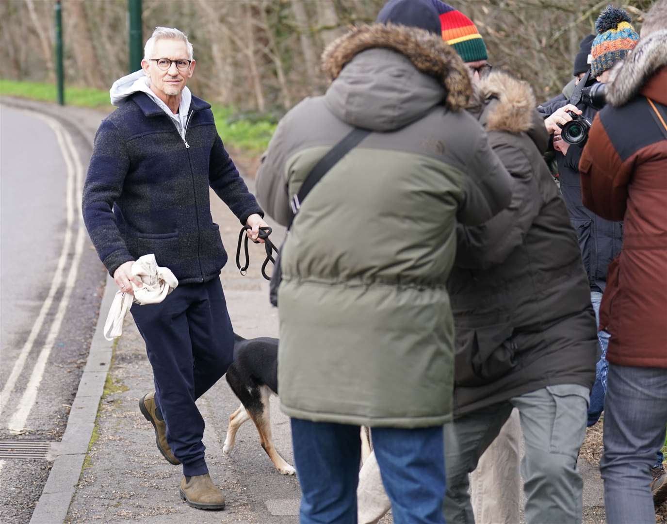 Photographers crowd around Match Of The Day host Gary Lineker (James Manning/PA)