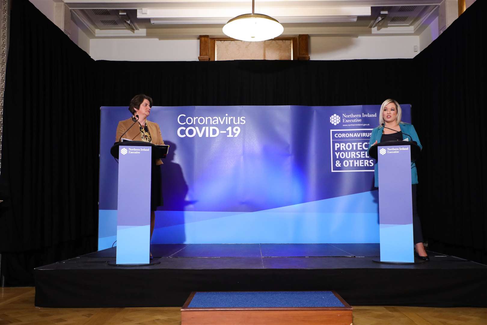 First Minister Arlene Foster (left) and Deputy First Minister Michelle O’Neill are due to announce further easing of restrictions on Monday (Kelvin Boyes/PA)