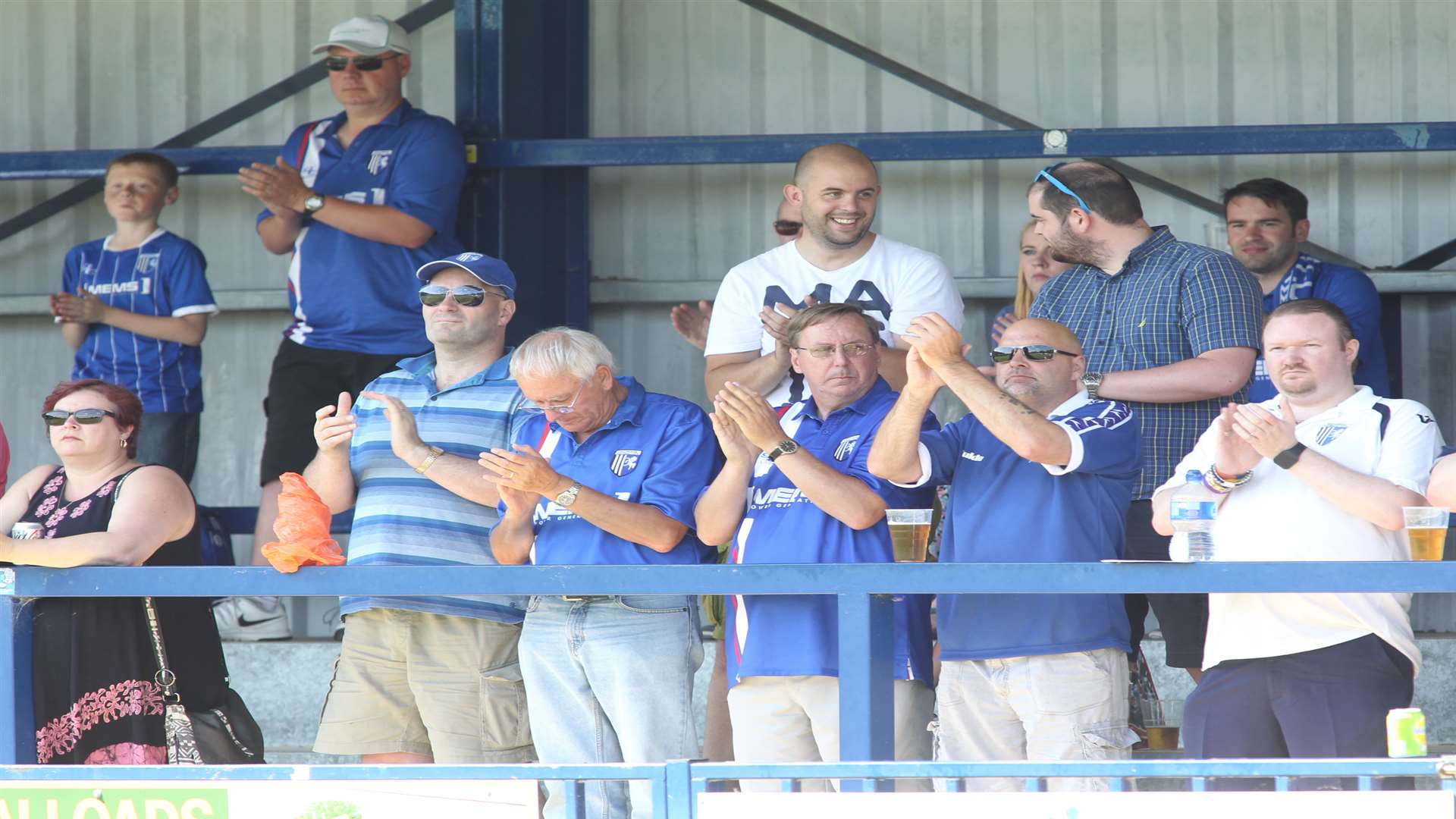 Fans pay their respects with a minute's applause