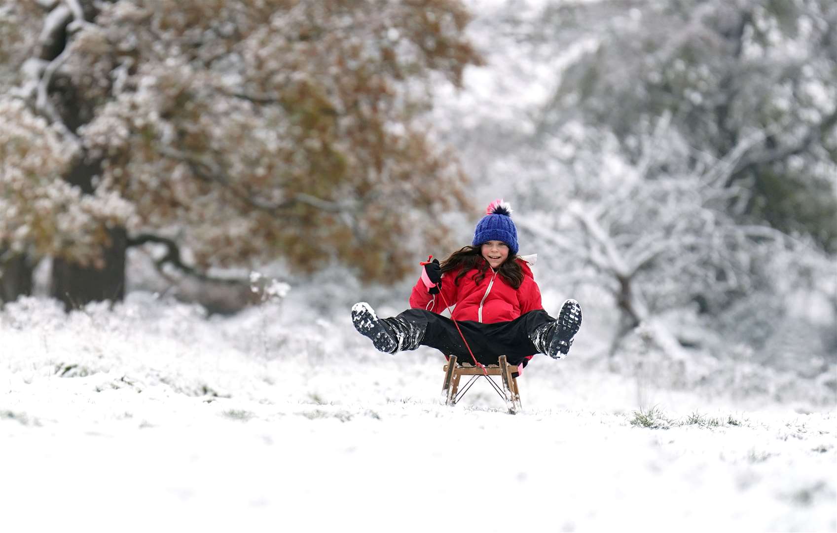 Sledging in London’s Richmond Park was the order of the day (James Manning/PA)