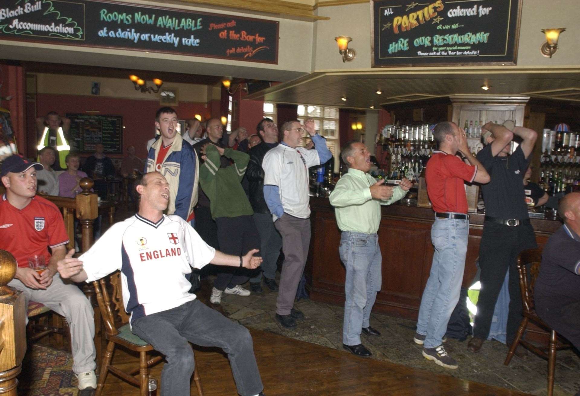 Reaction to a near-miss for England at the Black Bull pub in Folkestone in 2002. Picture: Dave Downey