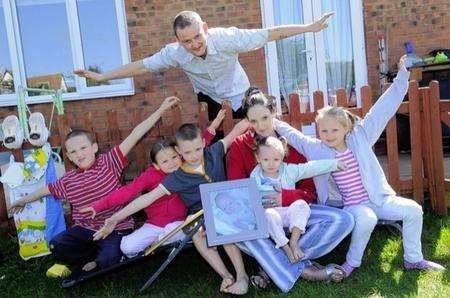 The Ranger family, from left, Charlie, eight, Bonnie, six, Jim, 11, Sarah, Alisha, three, and Helen, nine, with Jimmy above