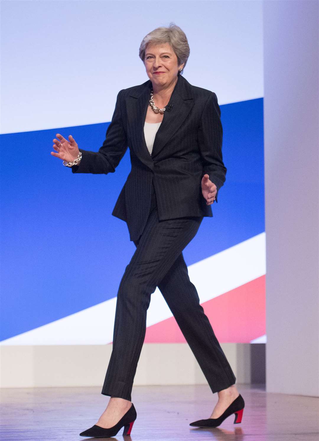 Former prime minister Theresa May dancing at a Conservative Party annual conference (Stefan Rousseau/PA)