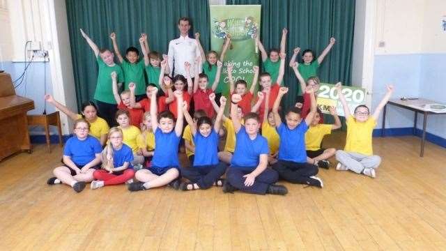 Jack Green with pupils at Mundella Primary School (22197730)