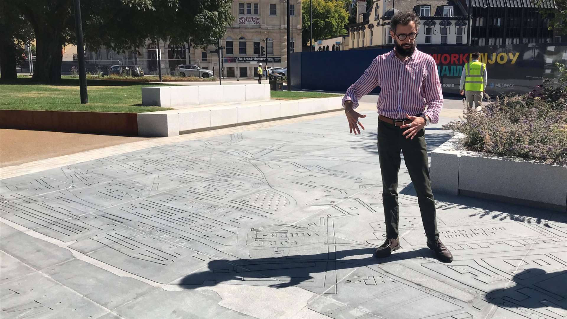 The paved space has a carving of a 19th century map of Chatham