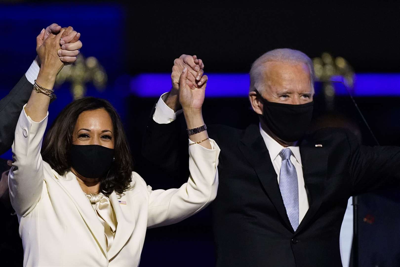 Vice President-elect Kamala Harris holds hands with President-elect Joe Biden (AP Photo/Andrew Harnik)