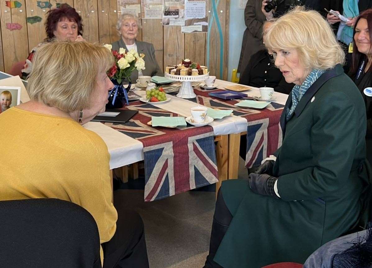 Camilla speaking with Marjorie Hawkins in Sheppey during a packed visit to the county