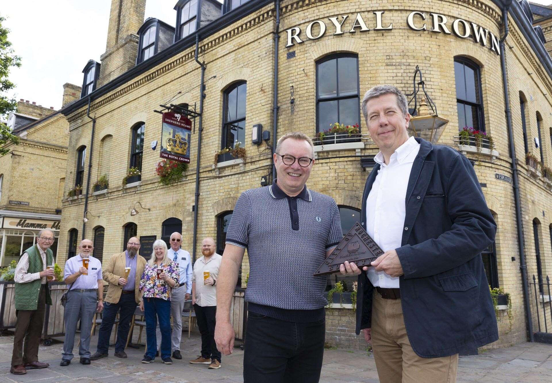 Robert Flood, chairman of the City of Rochester Society with Shepherd Neame's Martin Godden