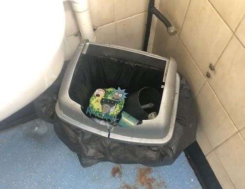 The bin, which was missing its lid, had definitely seen better days