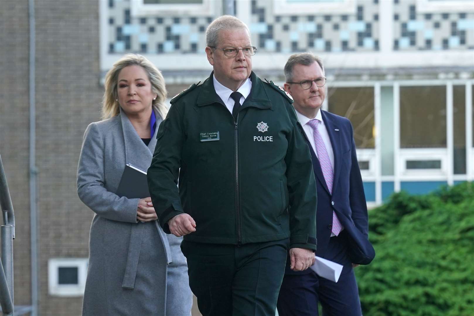 (left to right) Sinn Fein deputy leader Michelle O’Neill, Police Service of Northern Ireland (PSNI) Chief Constable Simon Byrne, and DUP leader Jeffrey Donaldson, arriving for a press conference outside the PSNI HQ in Belfast (Brian Lawless/PA)