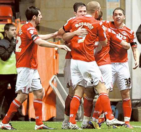 Charlton players celebrate their second goal scored by Hogan Ephraim