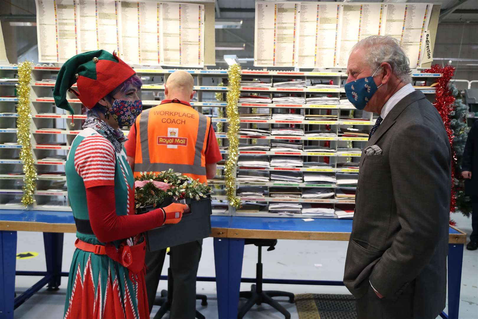 The Prince of Wales meets Royal Mail employee Catherine Griffiths (Geoff Caddick/PA)