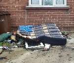 A mattress damaged in the blaze