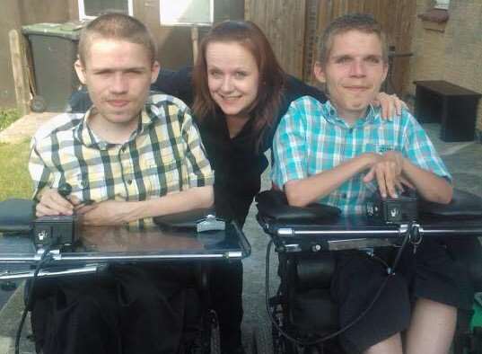 Ben Warman with sister, Stacey, and brother, Adam, who also suffers from muscular dystrophy