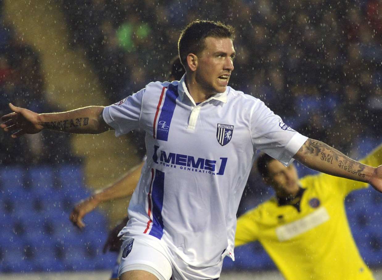 Gillingham's Cody McDonald celebrates scoring at Shrewsbury on Saturday. Picture: Barry Goodwin