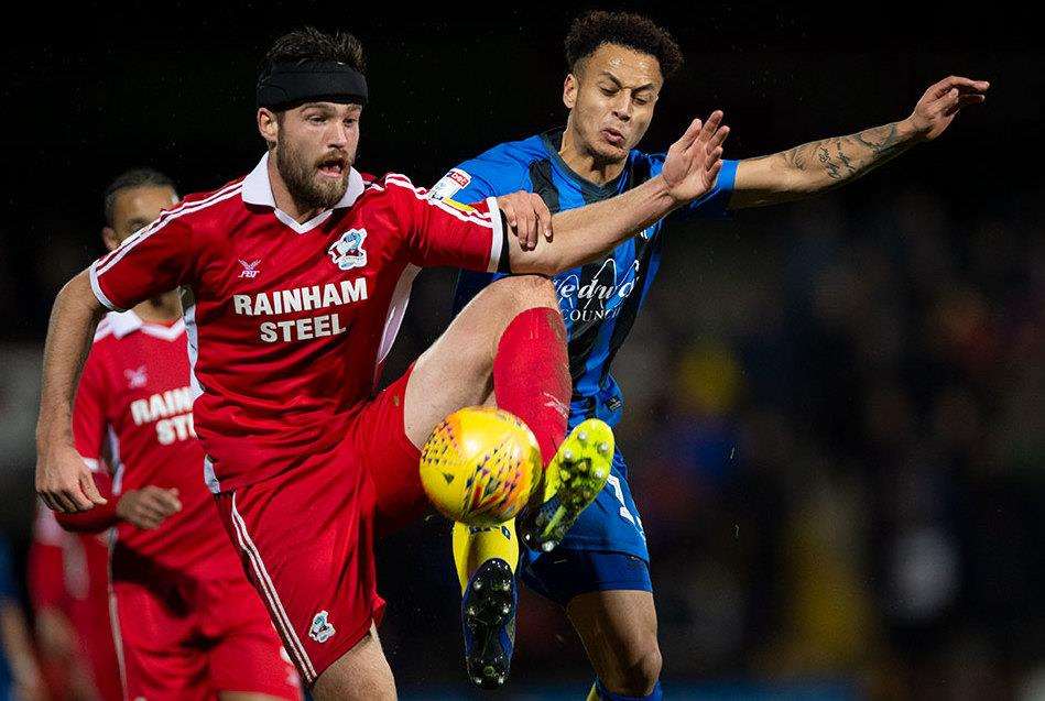 Gillingham's Elliot List puts the home side under pressure. Picture: Ady Kerry