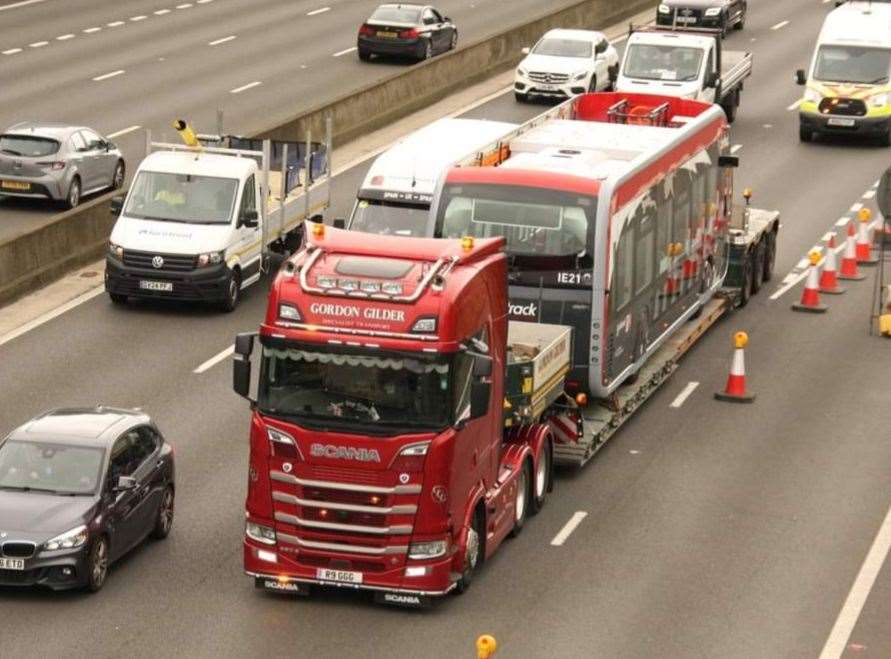 A transporter brings one of the first Fastrack electric buses to north Kent