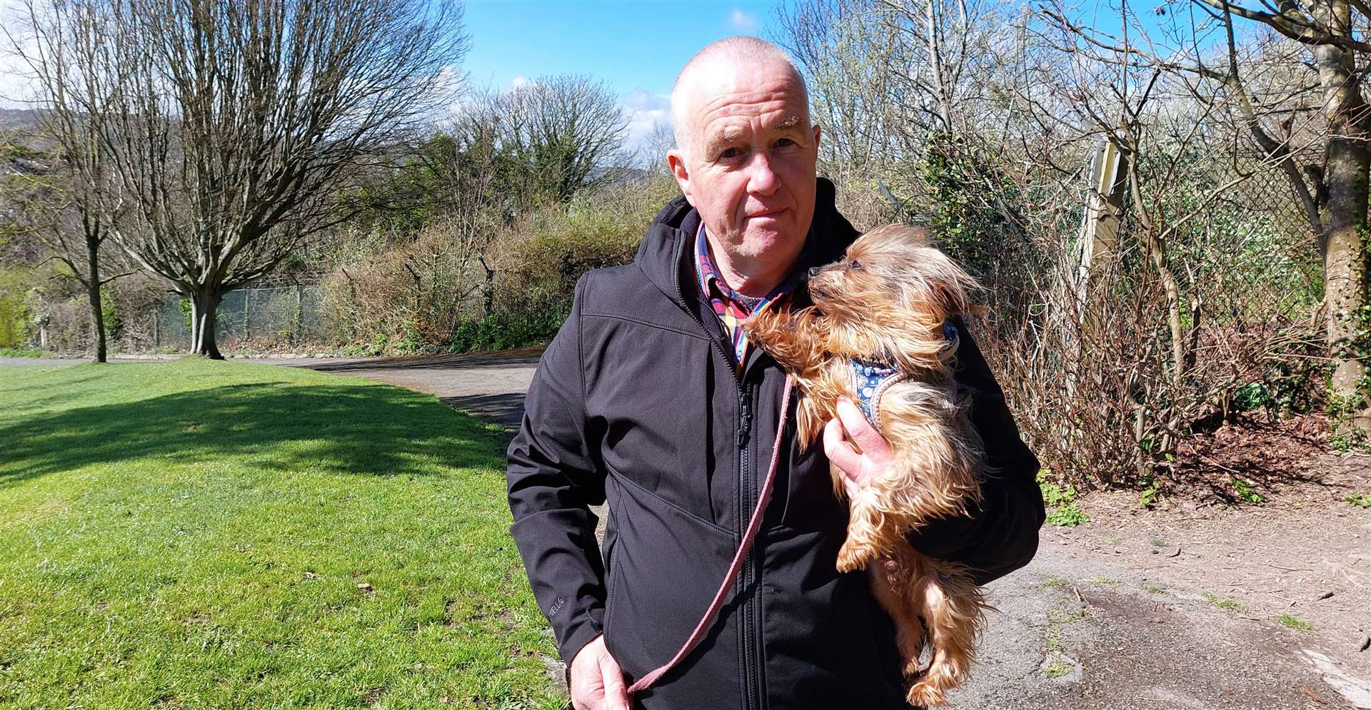 Gary Norris, with dog Caleb, says the council should fund more park patrols