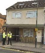 Police outside the premises where the tragedy happened