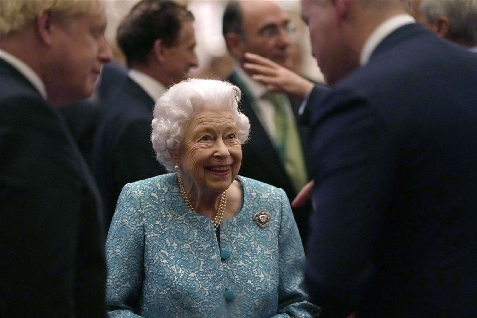 The Queen with Prime Minister Boris Johnson (left) during a reception for delegates of the Global Investment Conference at Windsor Castle on October 19 (Alastair Grant/PA)