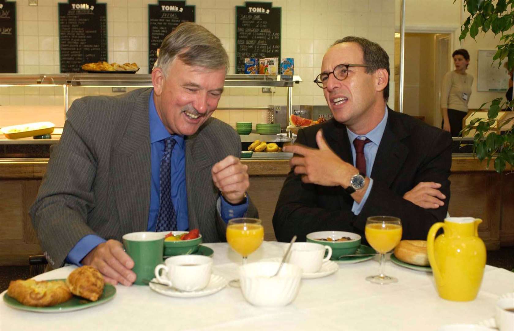 Loyd Grossman, with Sir Andrew Foster, assisted the NHS in improving the quality of its catering services (Fiona Hanson/PA)