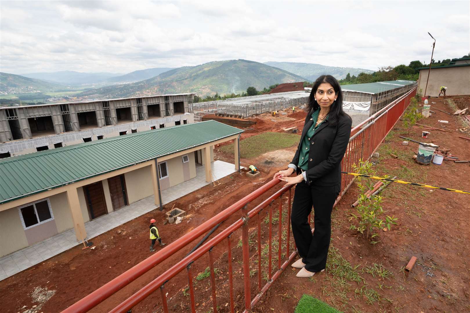 Home Secretary Suella Braverman tours a building site on the outskirts of Kigali (Stefan Rousseau/PA)