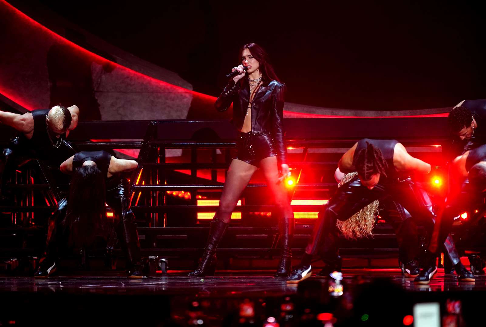 Dua Lipa performing during the Brit Awards 2024 (James Manning/PA)