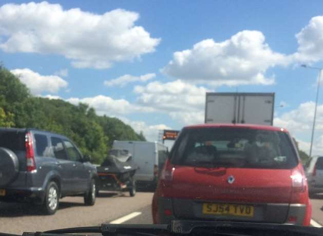 Traffic is queueing after a car fire on the M2. Picture: Luke Hewitt