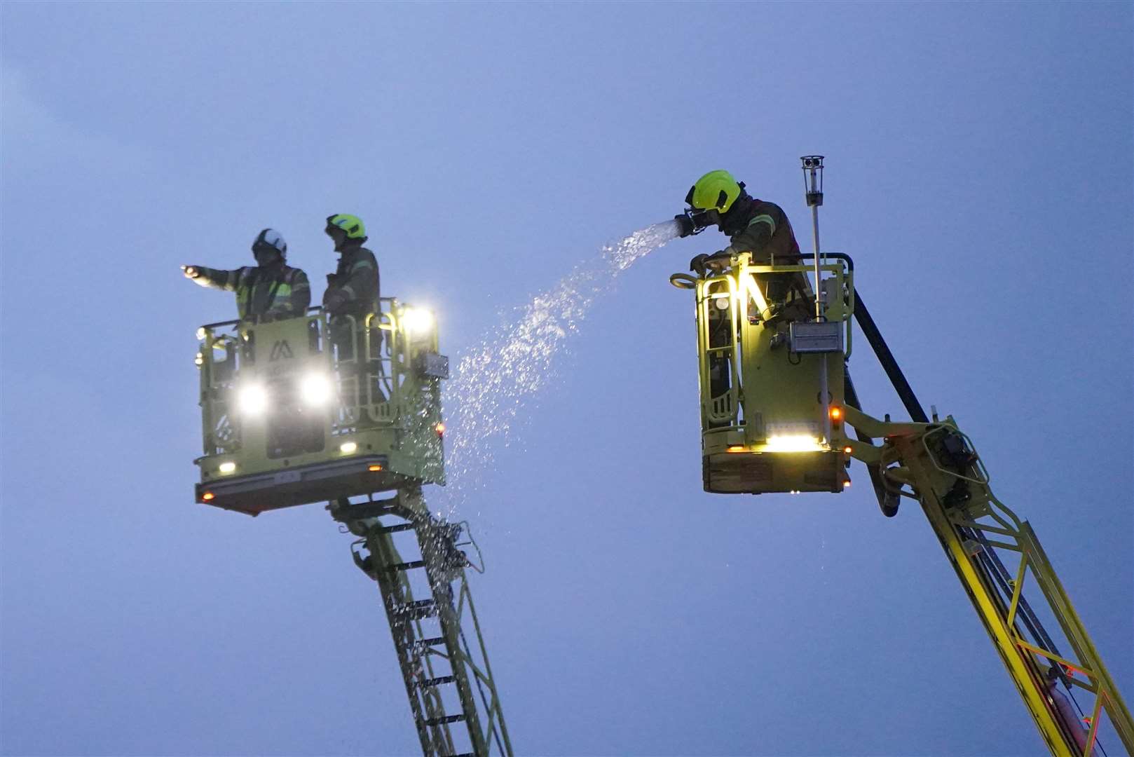 Firefighters at the scene in Fairfield Road, Bow (Jonathan Brady/PA)