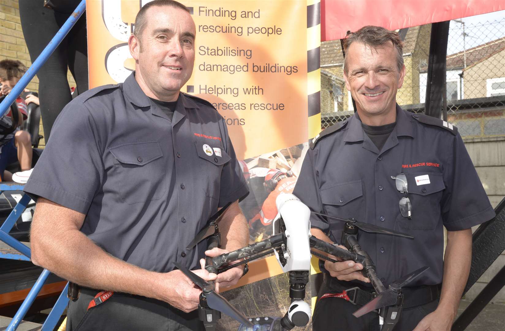 Firefighters Andy Parkes and Andy Taylor show off their drone at a Sheppey fire station open day
