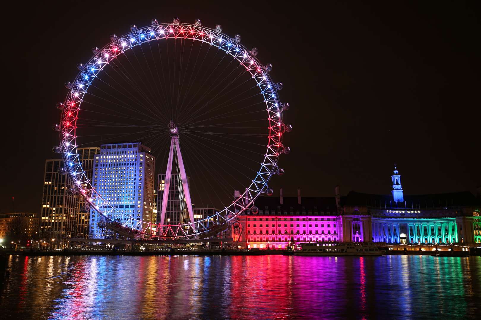 The London Eye and buildings along the South Bank were lit up with the colours of the Union flag during the nationwide clap (Jonathan Brady/PA)