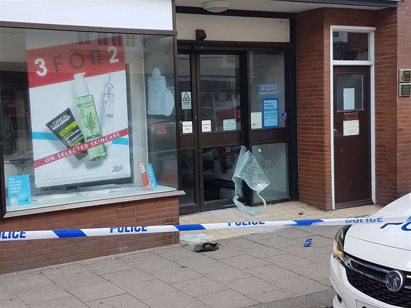 The door of the shop has been smashed (10956690)